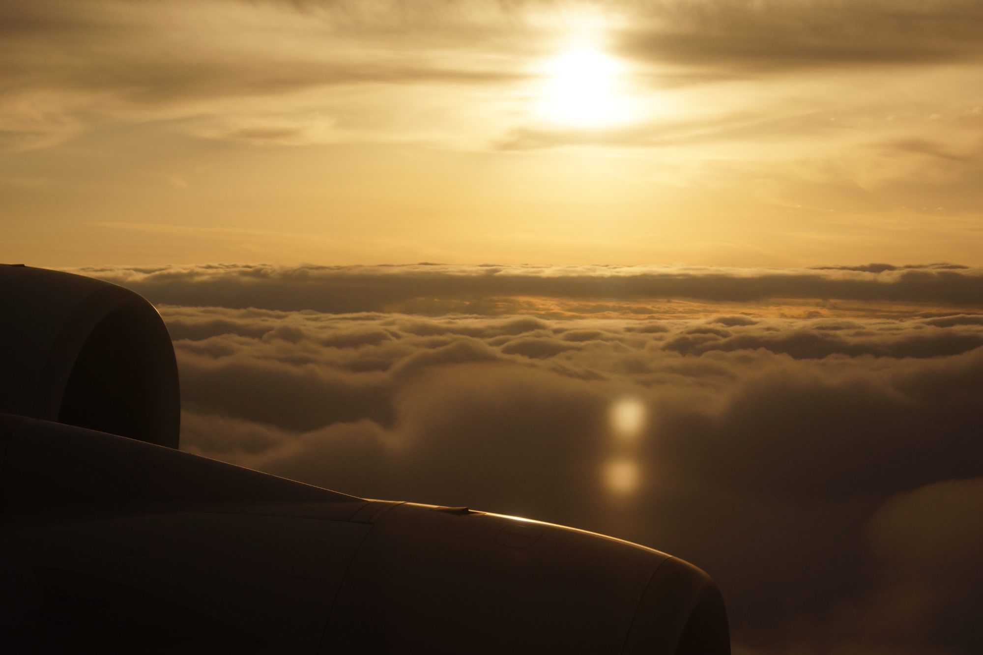 Above the clouds at golden hour